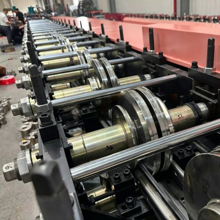 Xinnuo Heavy-Duty Upright Roll Forming Machine is a full-automatic production line for warehouse rack uprights. Equipped with multi-station forming rollers and intelligent PLC control system, it features high strength, precise dimension and stable running performance. Ideal for manufacturing heavy-load rack columns for industrial warehouses and logistics storage systems.