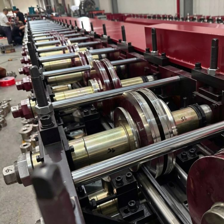 Xinnuo Heavy-Duty Upright Roll Forming Machine is a full-automatic production line for warehouse rack uprights. Equipped with multi-station forming rollers and intelligent PLC control system, it features high strength, precise dimension and stable running performance. Ideal for manufacturing heavy-load rack columns for industrial warehouses and logistics storage systems.