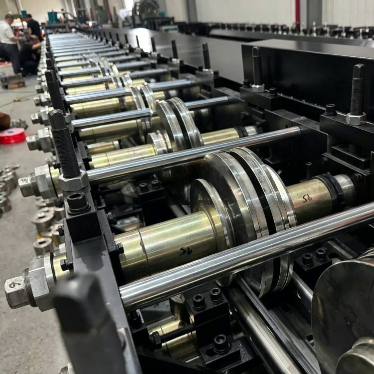 Xinnuo Heavy-Duty Upright Roll Forming Machine is a full-automatic production line for warehouse rack uprights. Equipped with multi-station forming rollers and intelligent PLC control system, it features high strength, precise dimension and stable running performance. Ideal for manufacturing heavy-load rack columns for industrial warehouses and logistics storage systems.